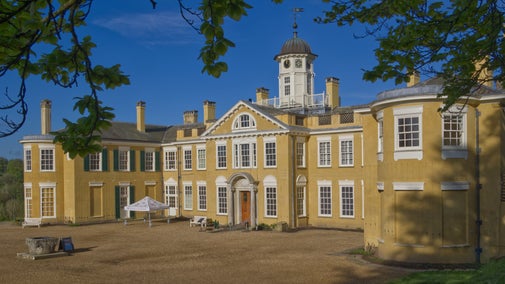 Polesden Lacey exterior of house with blue sky